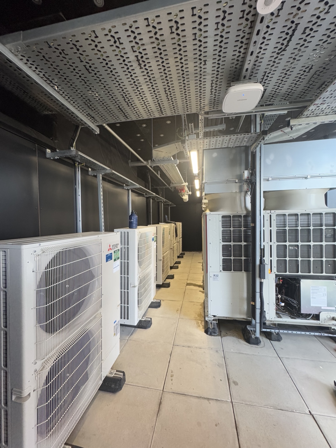 Mitsubishi Electric Hybrid VRF outdoor units installed in a dedicated plant area
